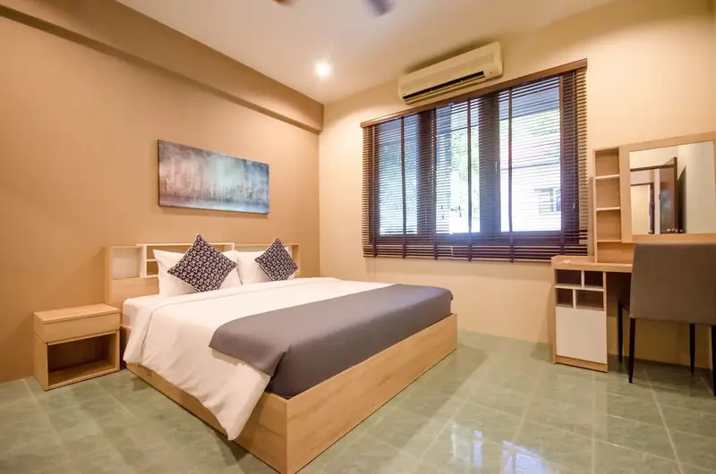 Bedroom with desk and wardrobe