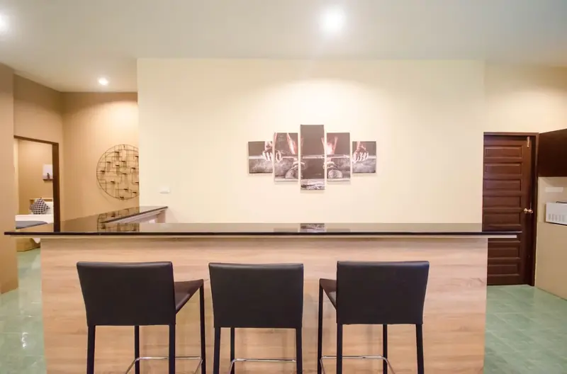 Breakfast bar with weightlifting artwork